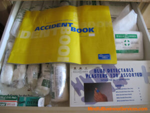 first aid drawer contents - book, bandages and other items