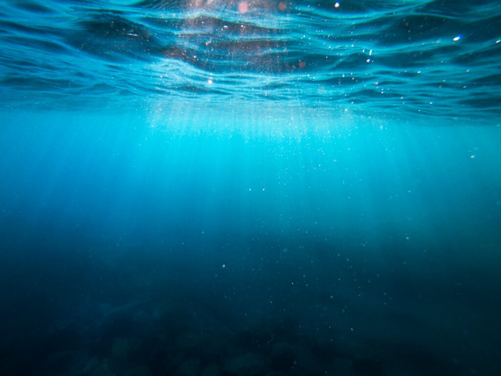 sun rays through water from underneath