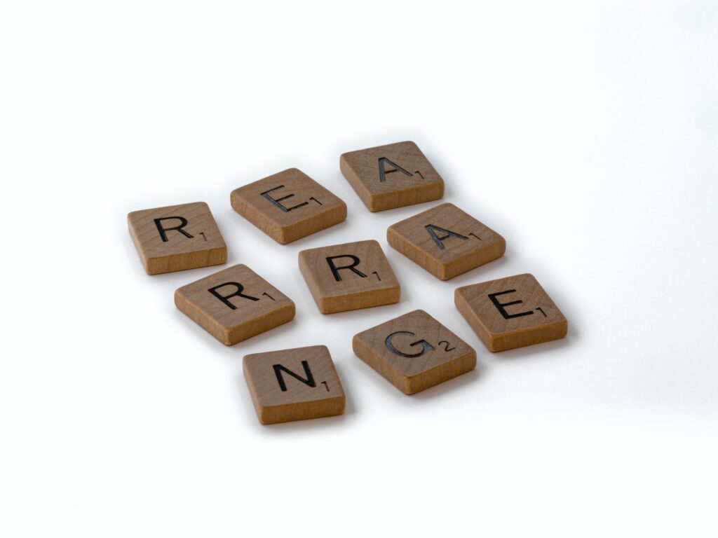 scrabble tiles in a block of 3x3 that spell rearrange